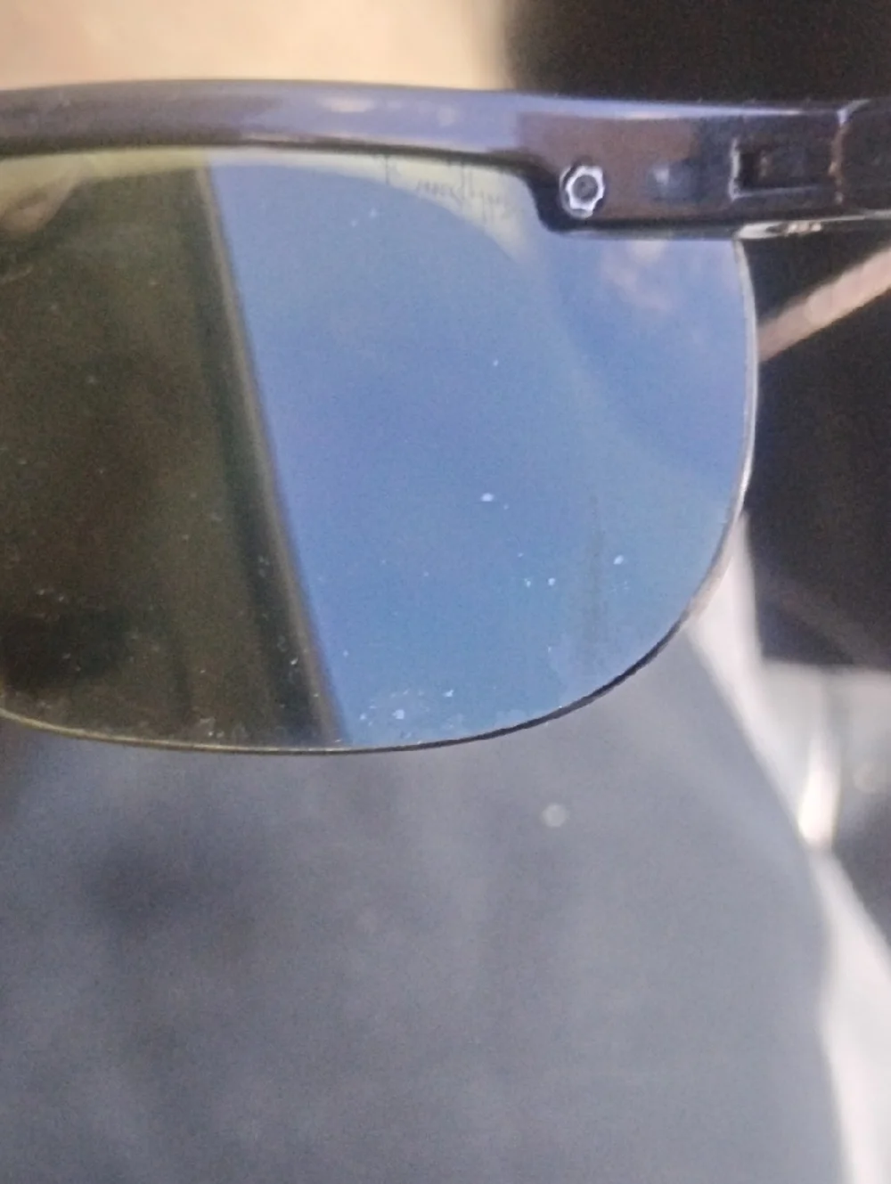 Ray-Ban Black Frame Sunglasses with Reflective Gray-Green Lenses